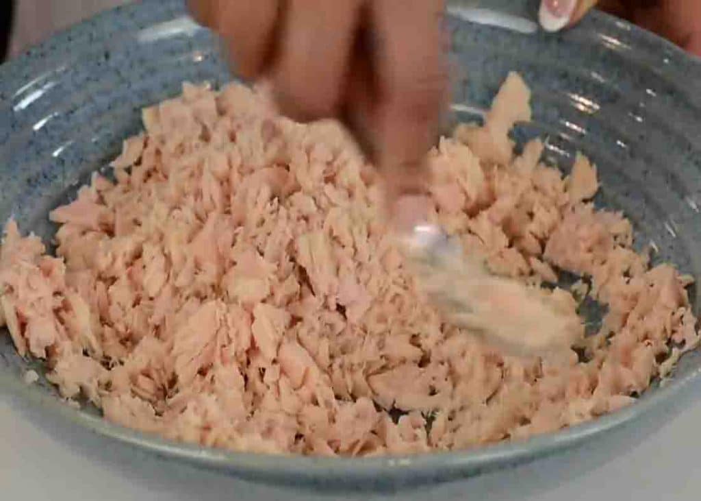 Mashing down the tuna for the tuna cakes