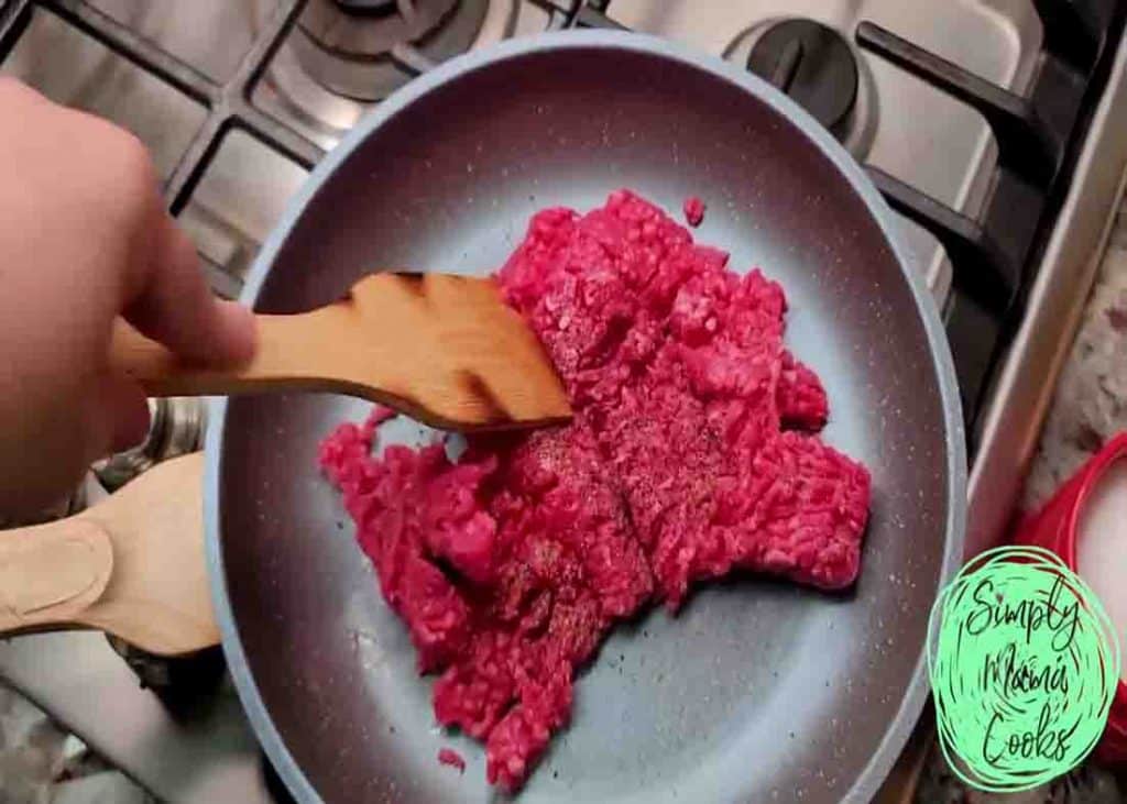Breaking up and cooking the ground beef