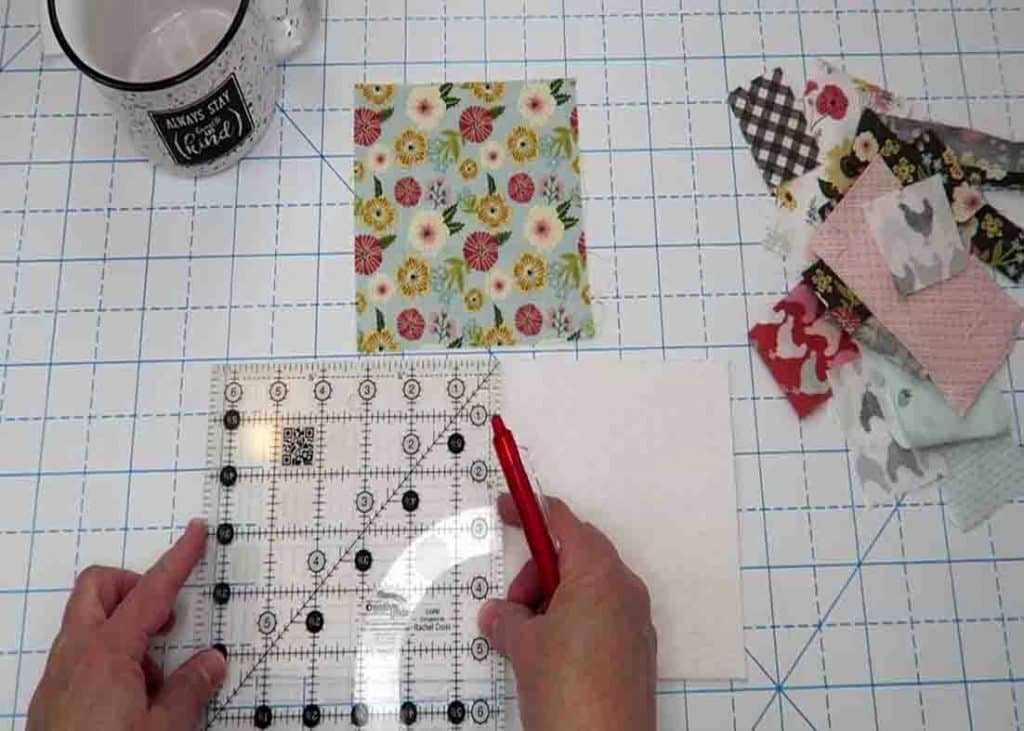 Measuring the quilted mug rug in half
