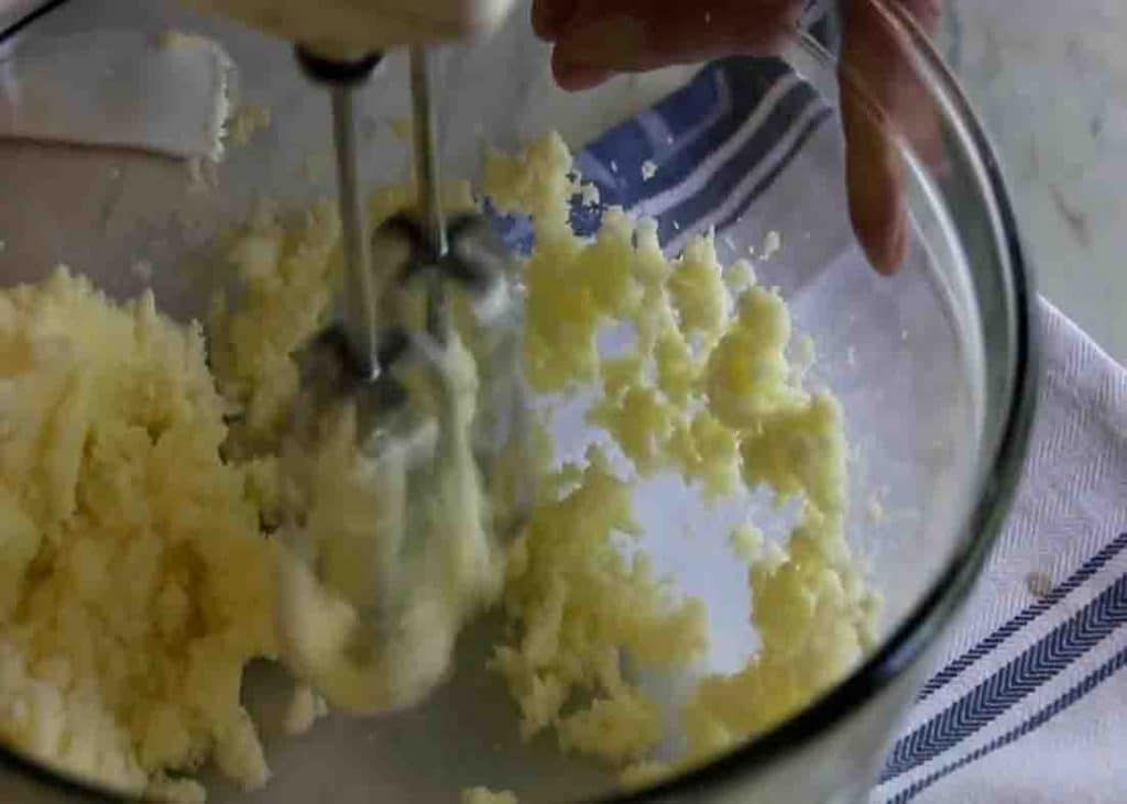 Mixing the flour and egg mixture for the lemon cookies