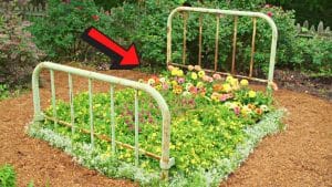 Repurpose An Old Bed Frame Into A Flower Bed