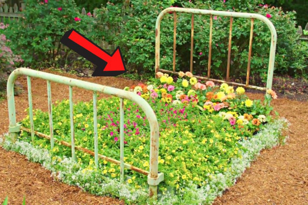 How To Repurpose An Old Bed Frame Into A Flower Bed