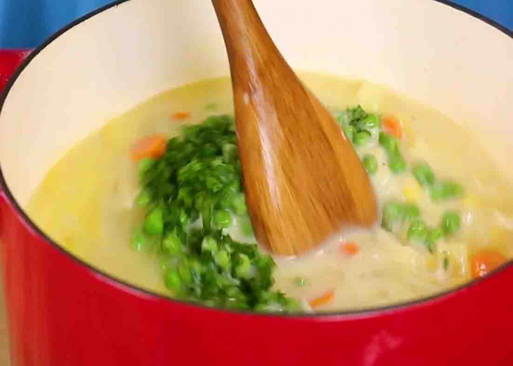 Finishing the chicken pot pie soup