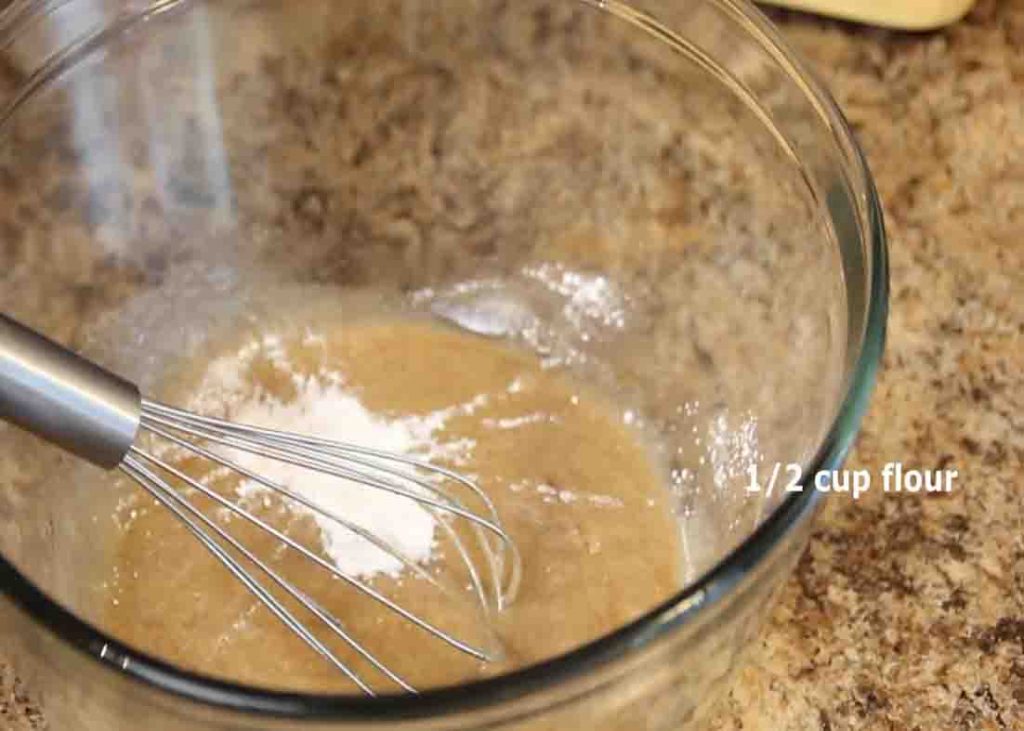 Mixing the ingredients of one-bowl pineapple cake recipe