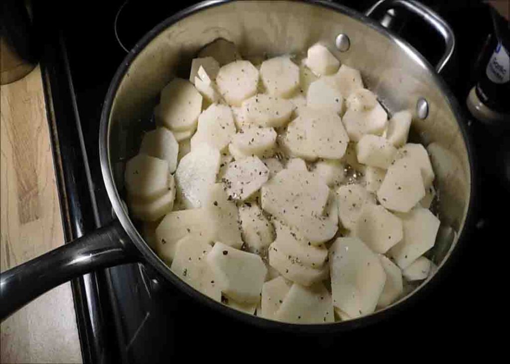 Frying and seasoning the potatoes