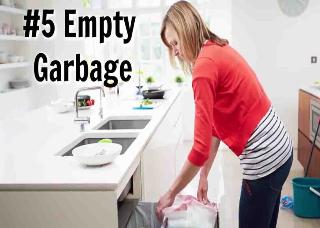 Emptying all the trash bins in your house