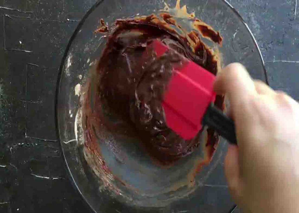 Mixing the chocolate mixture for the air fryer brownies recipe