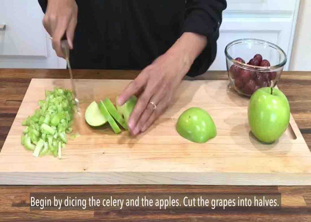 Chopping the apple into small pieces for the Waldorf salad