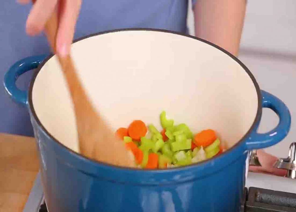 Cooking the carrots, celery, and onion for the chicken soup