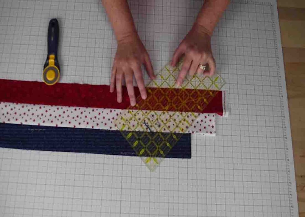 Cutting the strip set to make the lone star quilt block