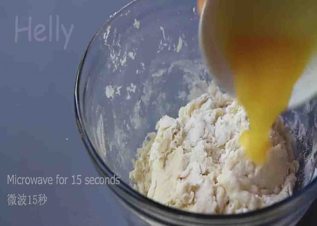 Combining the ingredients for the peanut butter bread rolls recipe