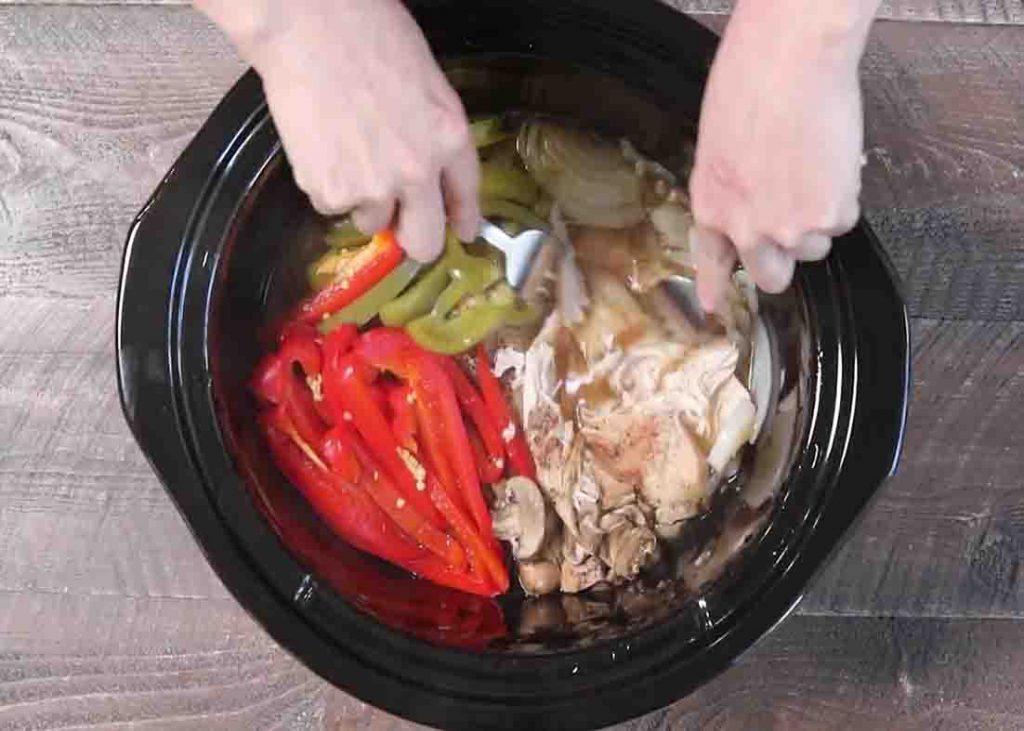 Shredding the chicken in the slow cooker
