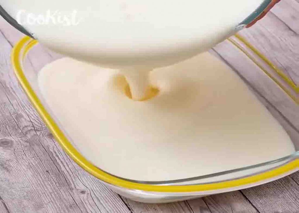 Transfer the creamy cake mixture to a baking dish