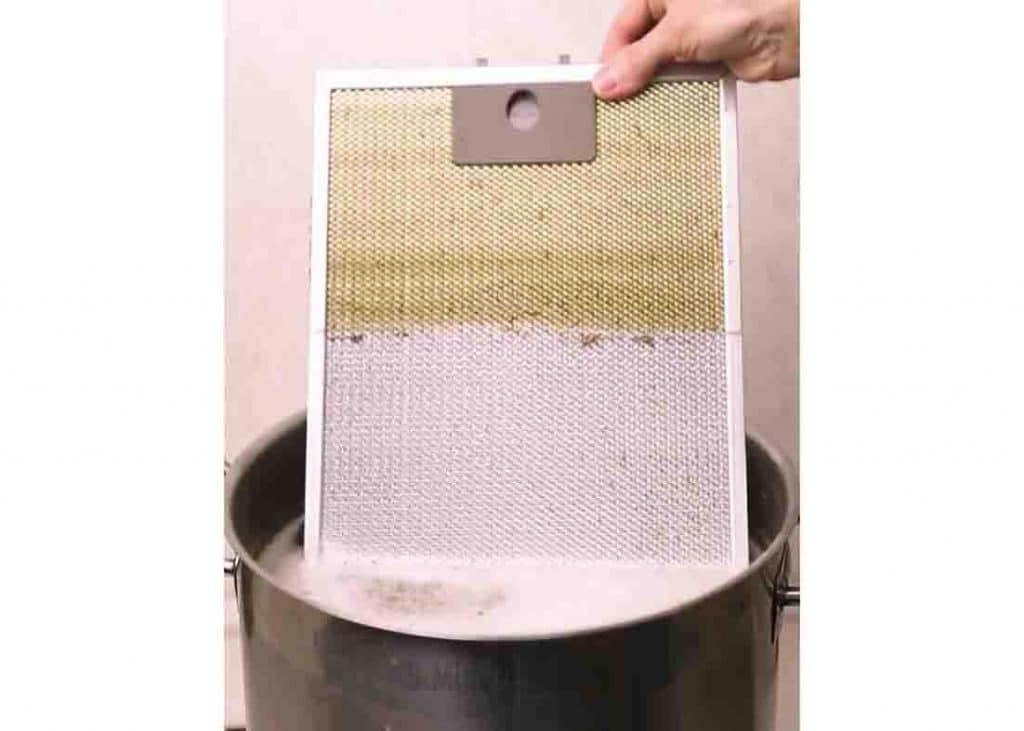 Soaking the stove filter to the homemade solution