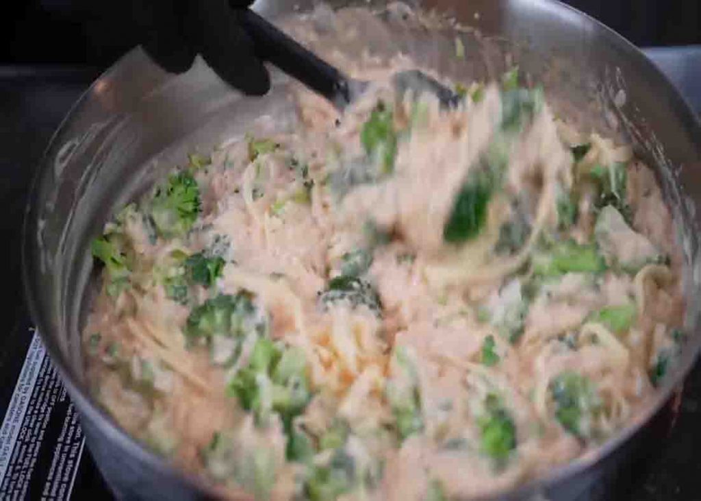 Adding the broccoli to the cream mixture