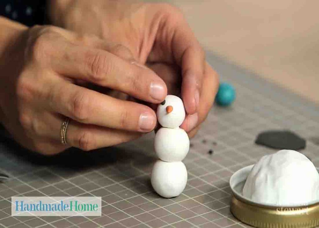 Making the snowman for the homemade snow globe