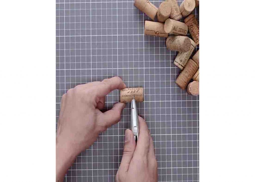 Cutting the wine corks in half to make a placemat