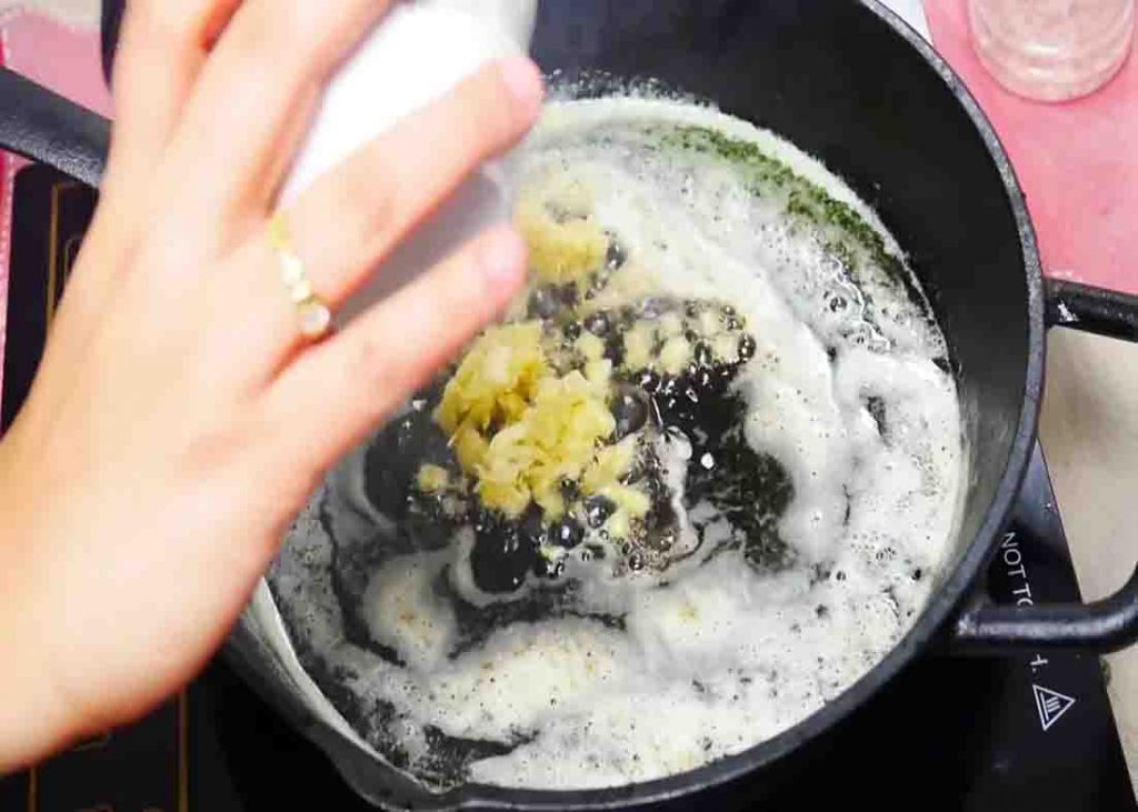 Sauteing the garlic for the honey garlic salmon