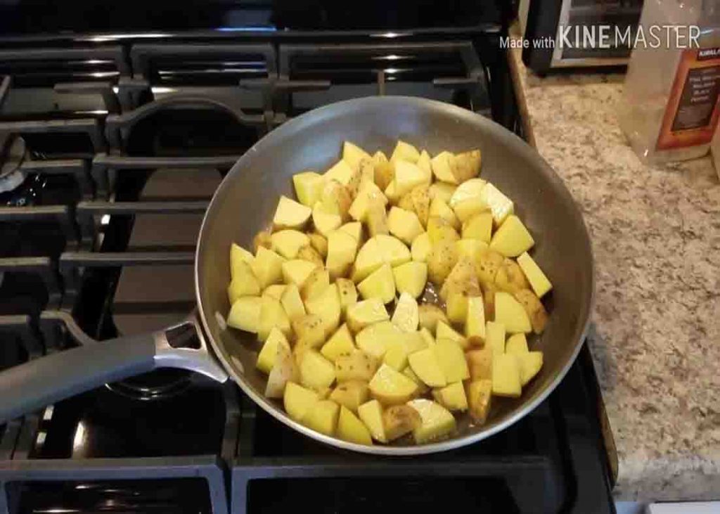 Frying the potatoes for the garlic parmesan skillet potatoes recipe