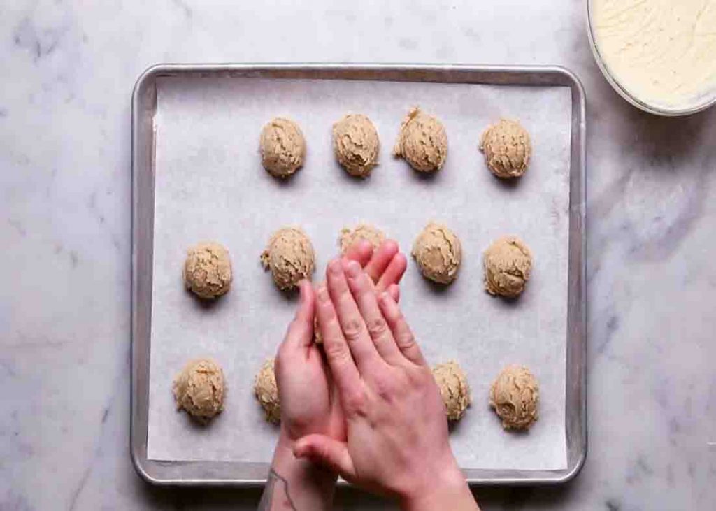 Shaping the cookie dough into balls