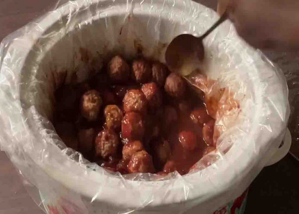Cooking the cranberry meatballs to the slow cooker