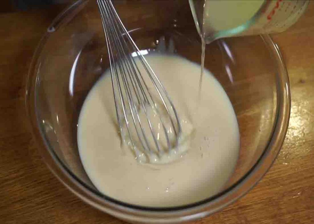 Mixing the ingredients for the 3-ingredient lemon icebox pie