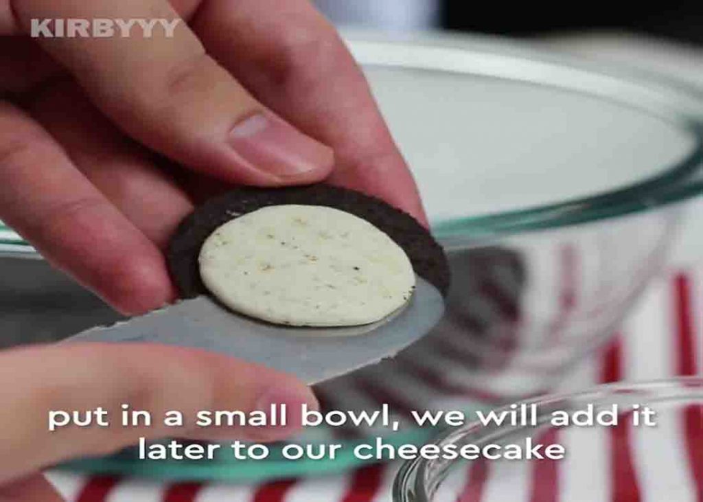 Separating the filling and the Oreo cookies for the Oreo cheesecake recipe