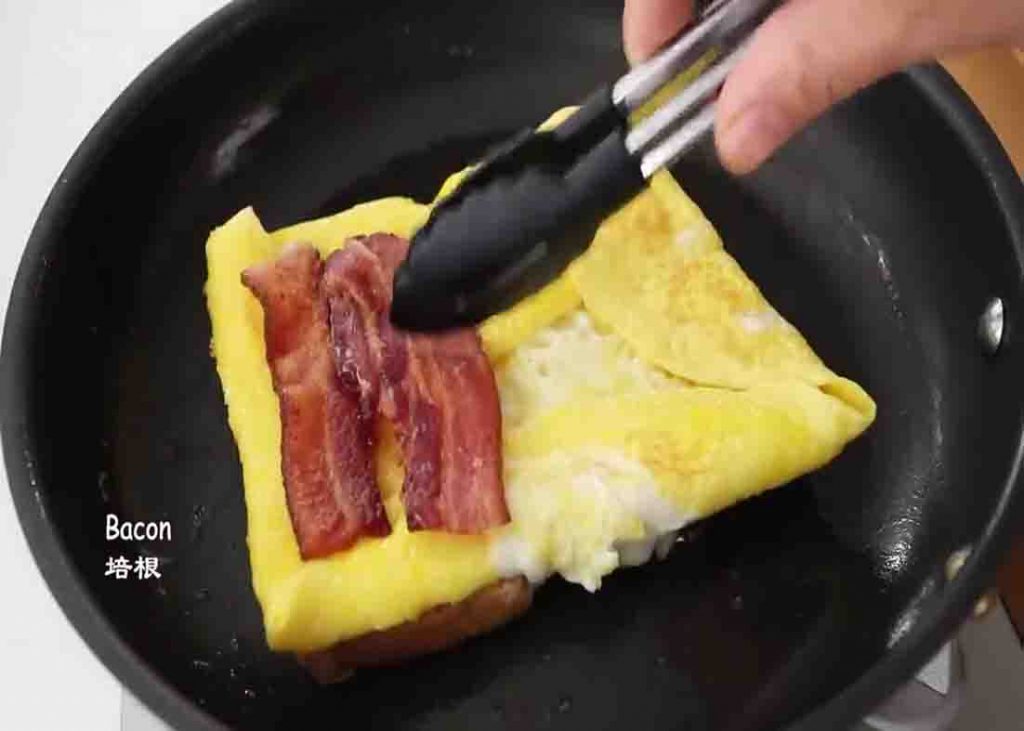 Adding the fillings for the egg toast