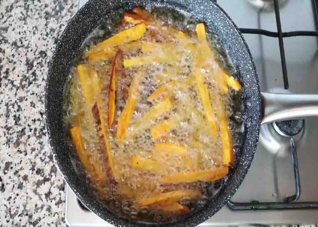 Frying the sweet potato fries