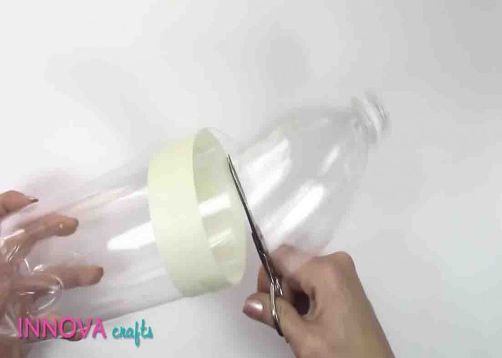 Cutting the plastic bottle to make DIY bracelets