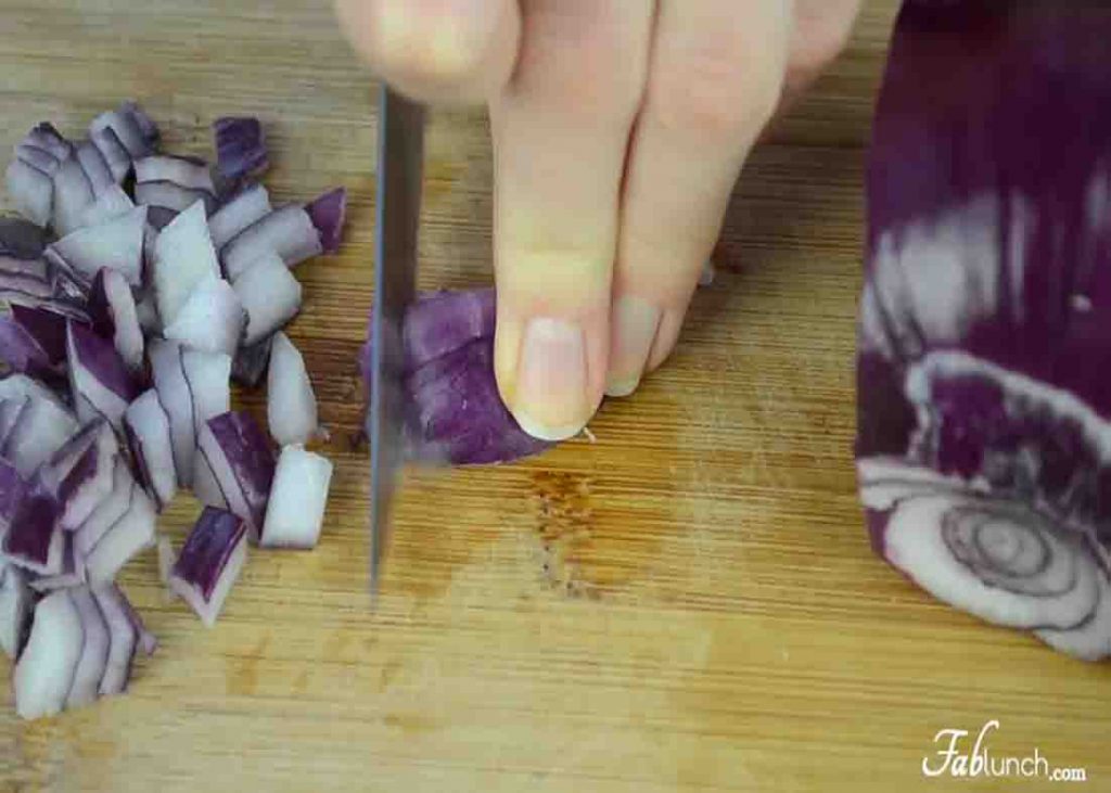 Dicing the onion for the homemade salsa recipe