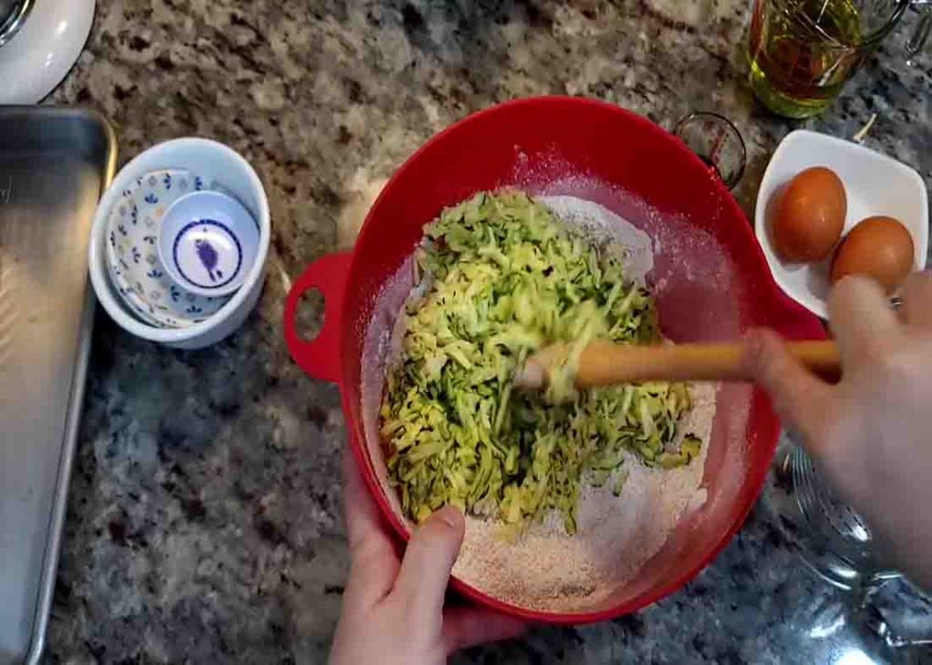 Combining the ingredients for the zucchini bread recipe