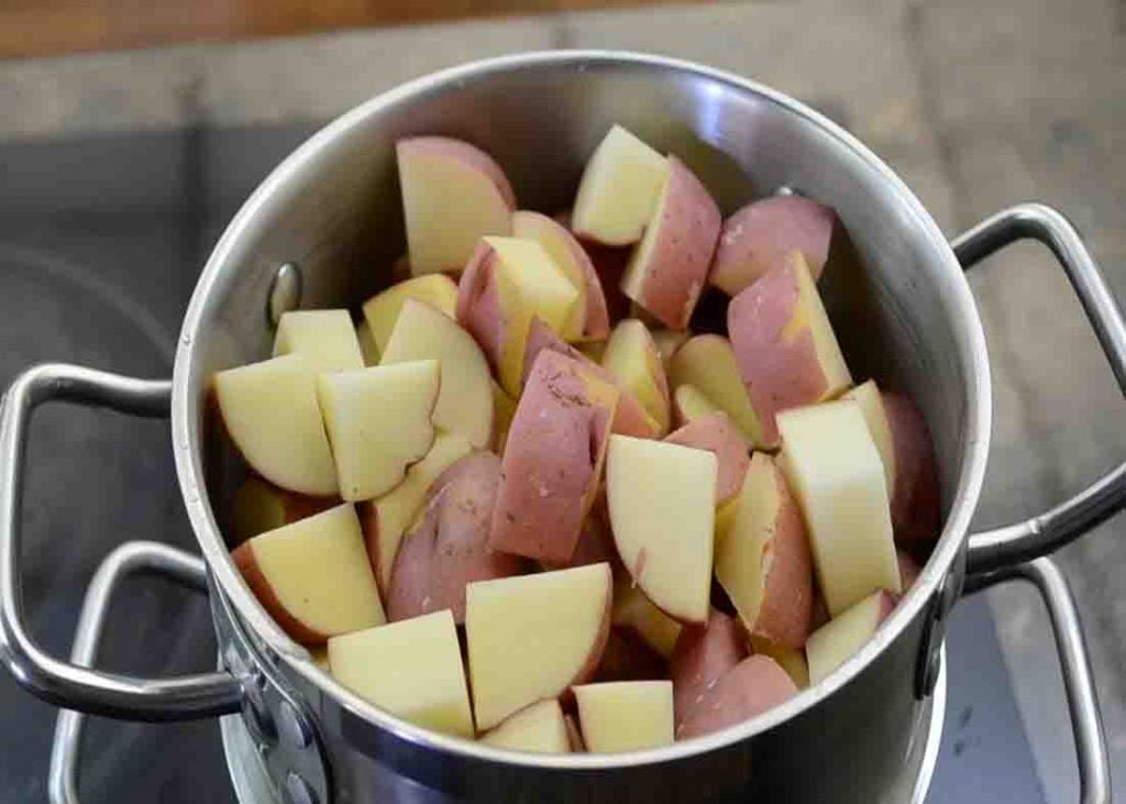 Steaming the potatoes for the potato salad recipe