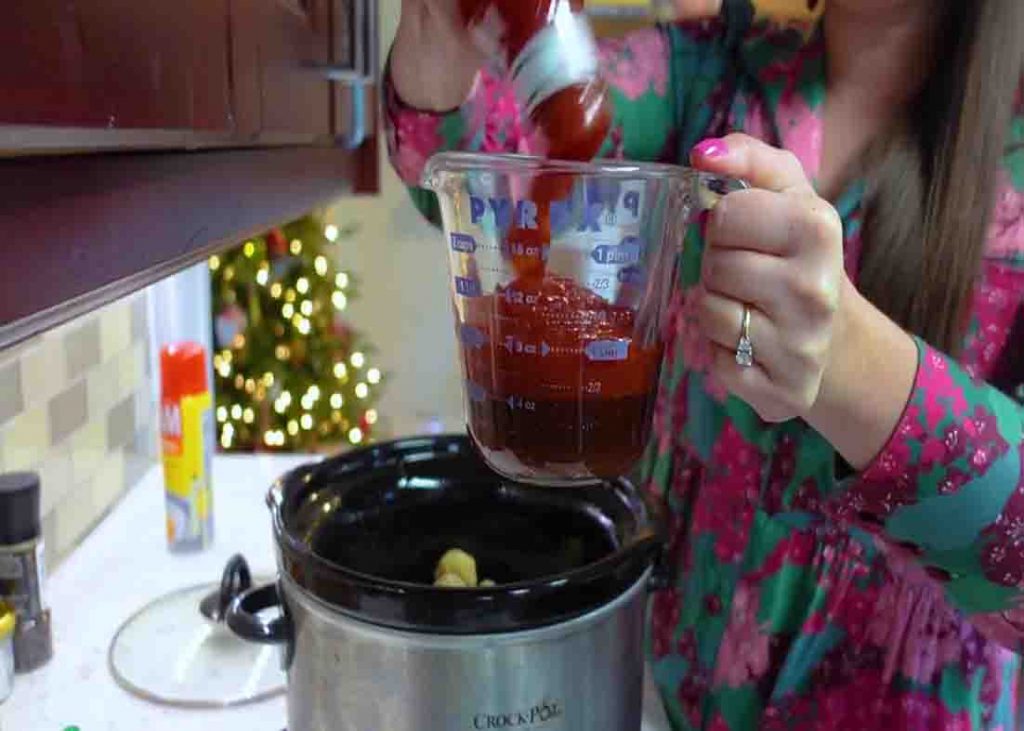 Mixing all the sauce ingredients for the old-school slow cooker grape jelly meatballs