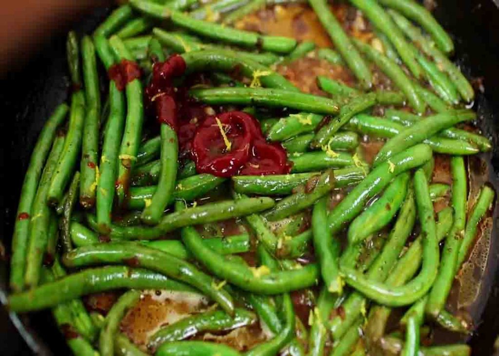 Cooking the green beans for the one-pan chicken and veggies recipe