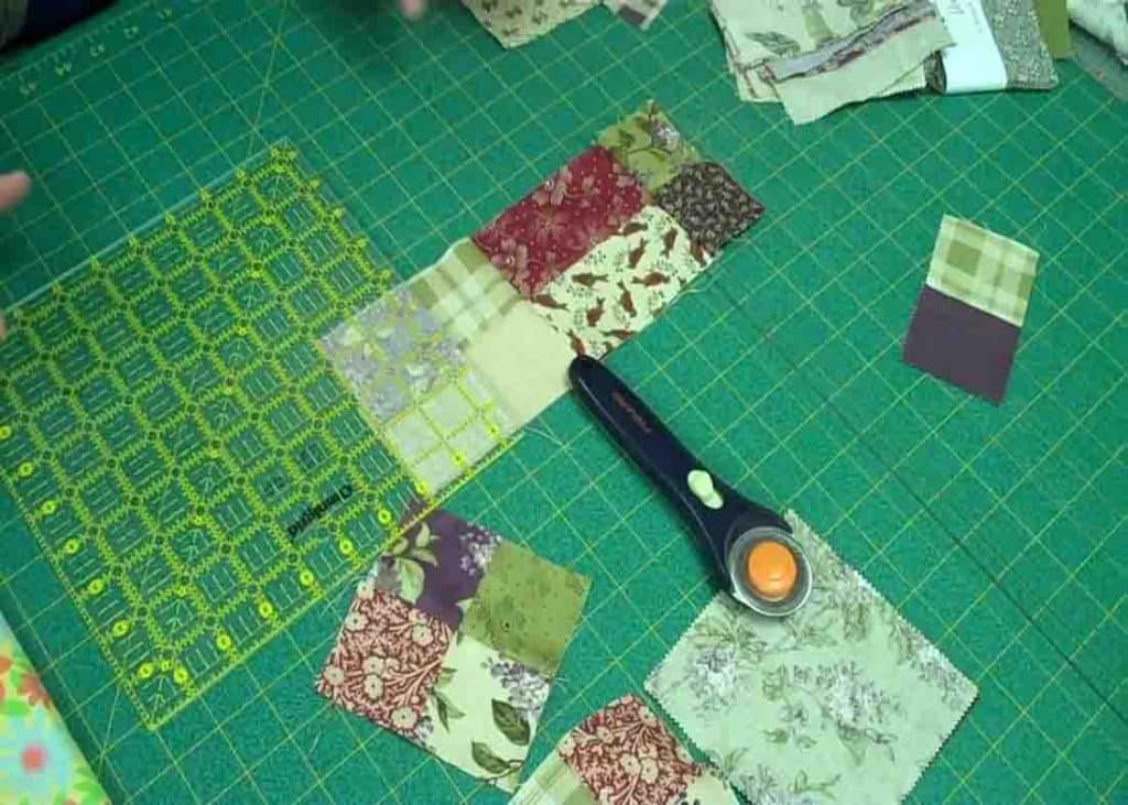 Sewing the pieces together for the scrappy 4-patch quilt