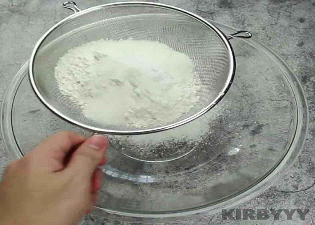 Sifting the pancake cereal's dry ingredients