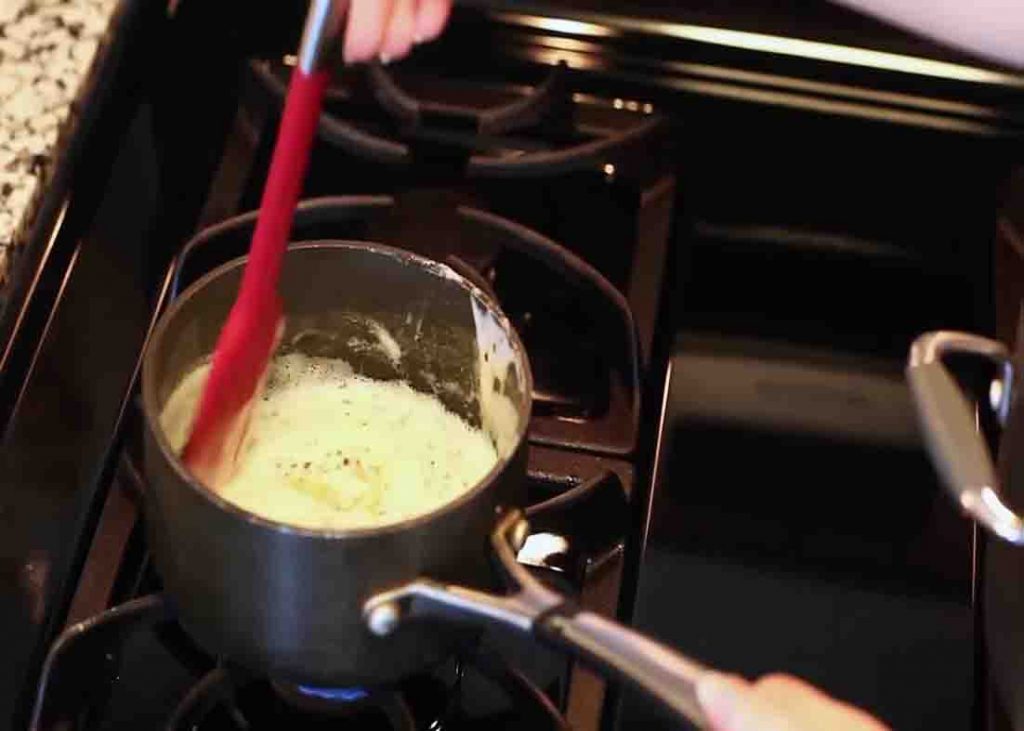 Making the sauce for the garlic baby potatoes