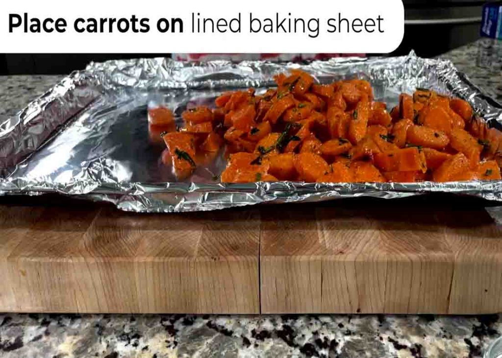 Putting the carrots in the baking sheet