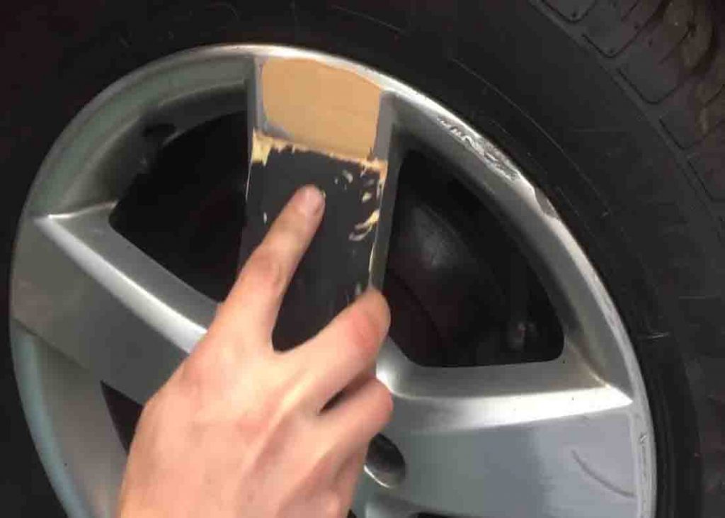 Put some filler on deeper scratches in your wheel rim