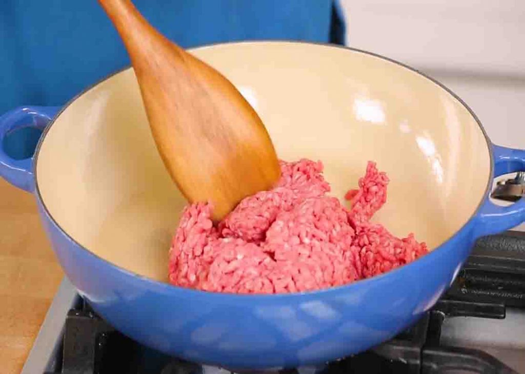 Breaking and cooking the ground beef for the beef taco skillet recipe