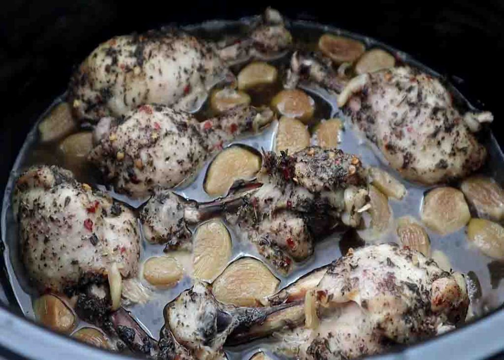 Slow cooking the chicken drumsticks