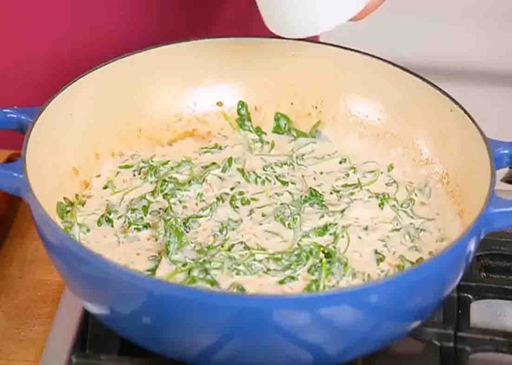 Making the sauce for the creamy salmon pasta