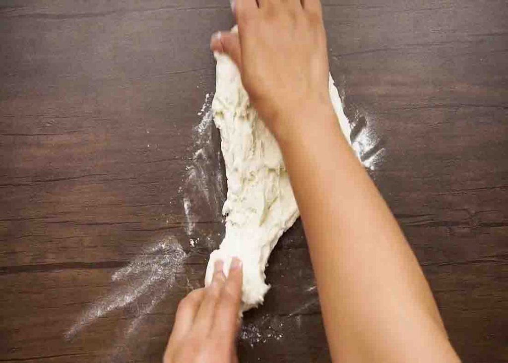 Kneading the cheddar rolls dough