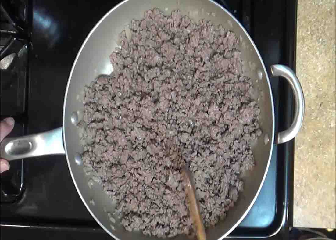 Cooking the ground beef for the creamy beef pasta recipe