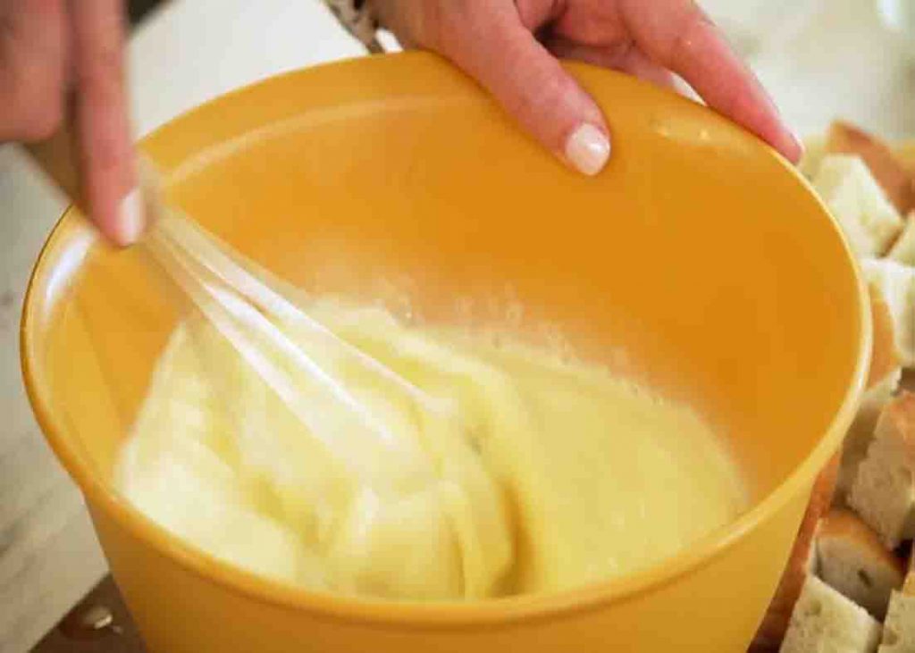 Mixing the custard mixture for the French casserole recipe