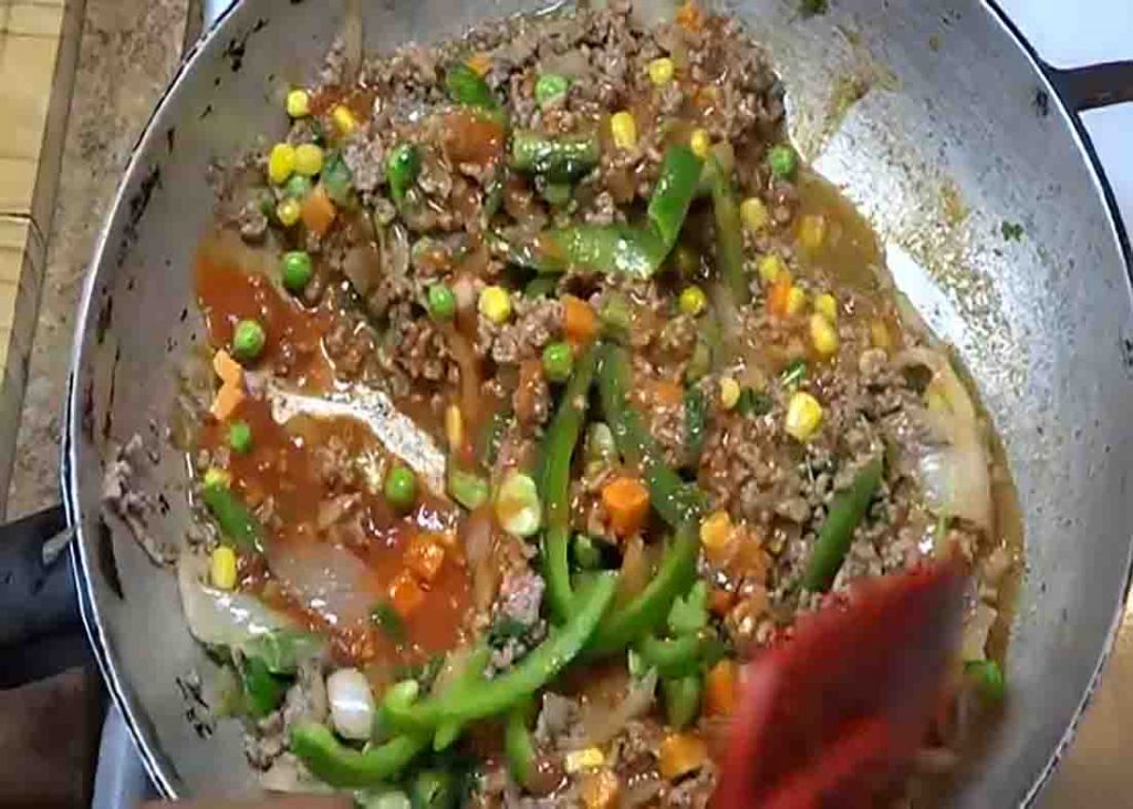 Cooking the ground beef and veggies
