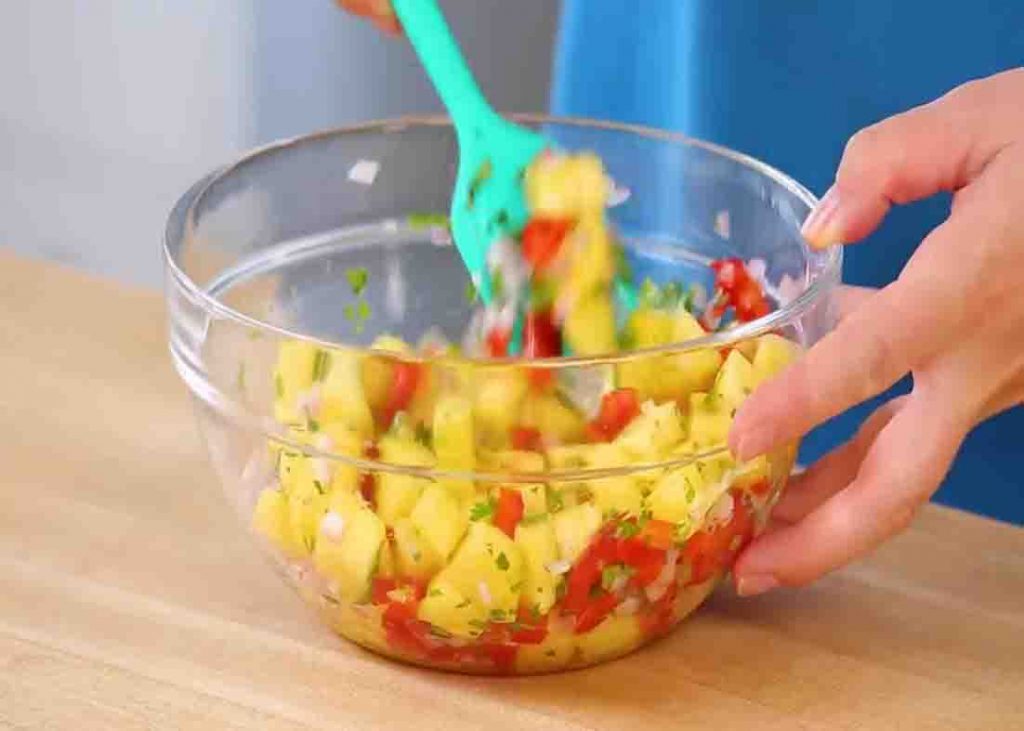Making the pineapple salsa