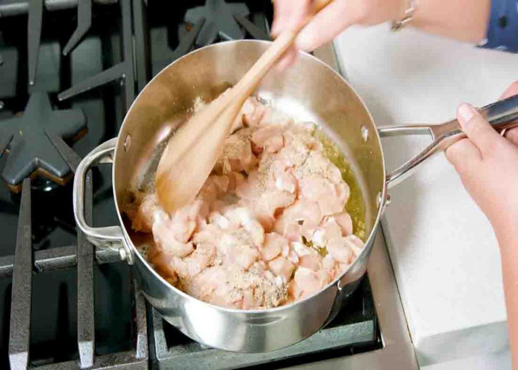 Sauteing the chicken for the one-pot chicken and pasta recipe