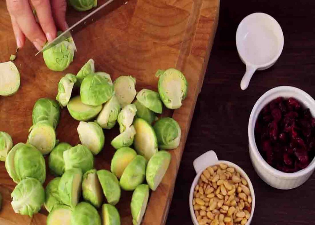 Chopping the brussels sprouts in halves